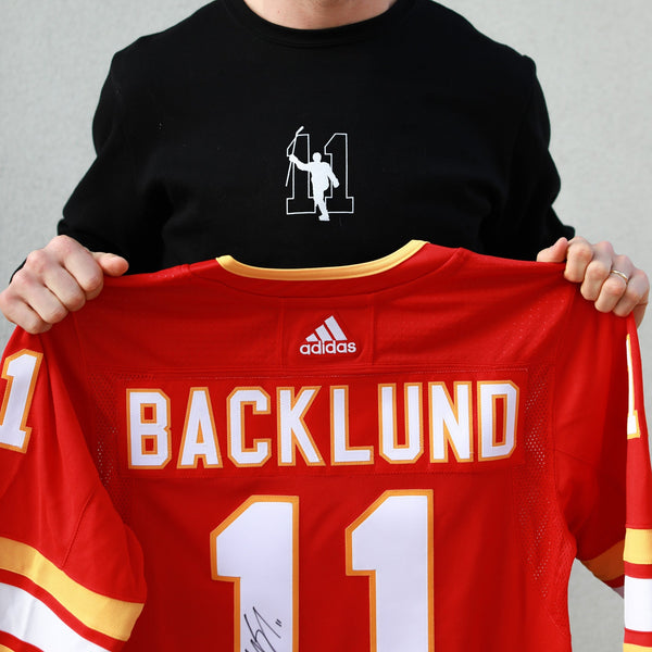 CALGARY FLAMES MIKAEL BACKLUND SIGNED RED JERSEY 8X10
