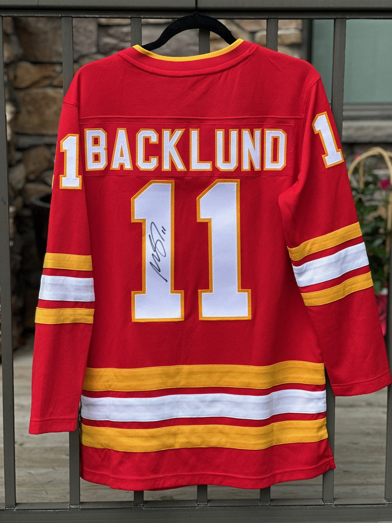 Mikael Backlund signed Flames Jersey (red) + Memories in Bloom hoodie