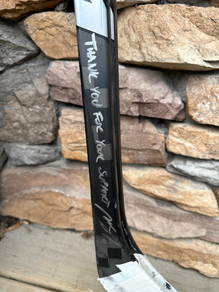 Mikael Backlund Signed Game used stick + Memory in Bloom hoodie