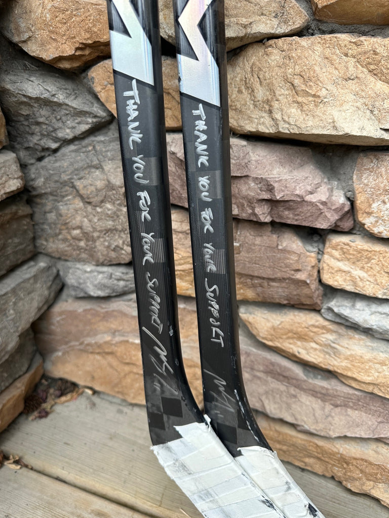 Mikael Backlund Signed Game used stick + Memory in Bloom hoodie